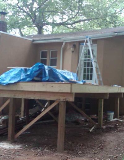 A house is being built in the woods.