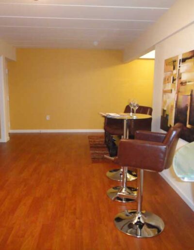A wooden floor in a living room.