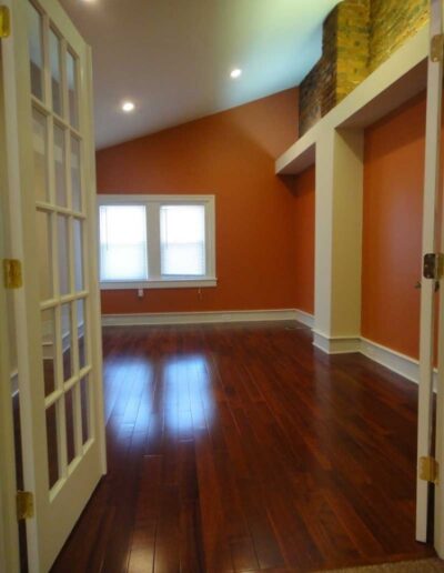 A wooden floor in a room.